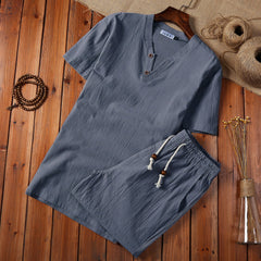 Cotton And Linen Two-piece Buckle Suit Casual V-neck Two-piece Set displayed in gray color on wooden background